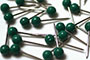 Green Color Map Push Pins in a Pile