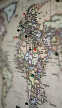 Mounted Map to Pinboard with Pins in Countries of Africa and Europe