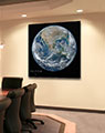 Business Conference Room with Poster of World in Space