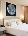 Print of Planet Earth in Hotel Room