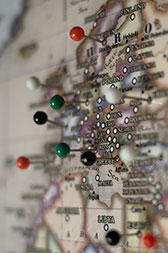 Mounted World Map with Pins to Mark Locations